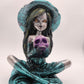 Teal Witch with a Skull - Resonating Crystal Creations