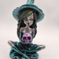 Teal Witch with a Skull - Resonating Crystal Creations